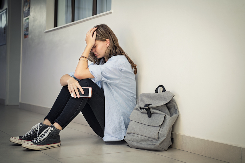 high school student experiencing test anxiety before exam