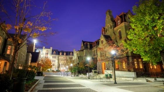 university of pennsylvania campus walkway lit up at night