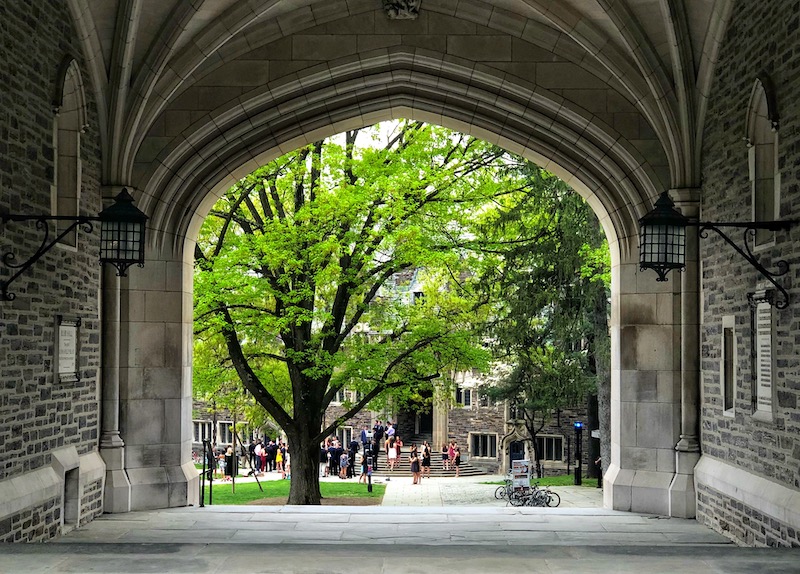 Archway on Princeton University's campus with trees in the background