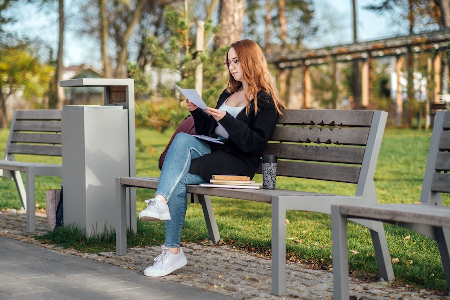 College Acceptance Rates. Next Steps After College Acceptance. A student girl holding a college acceptance letter, full of excitement for the future