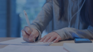 A student writing an application for an exam