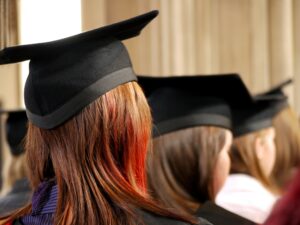 college graduation with students sitting