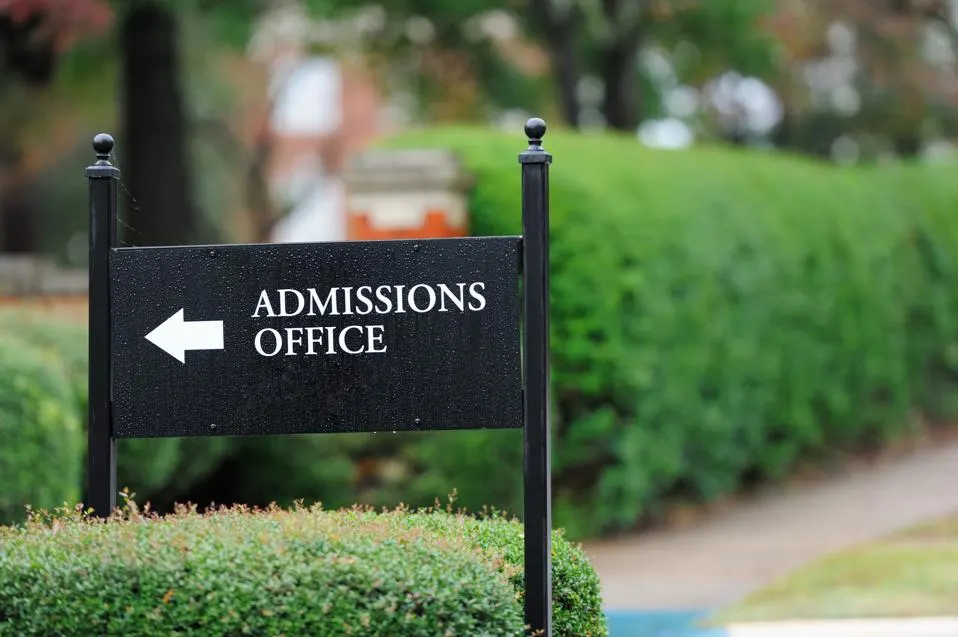 Admission office signs on a college campus