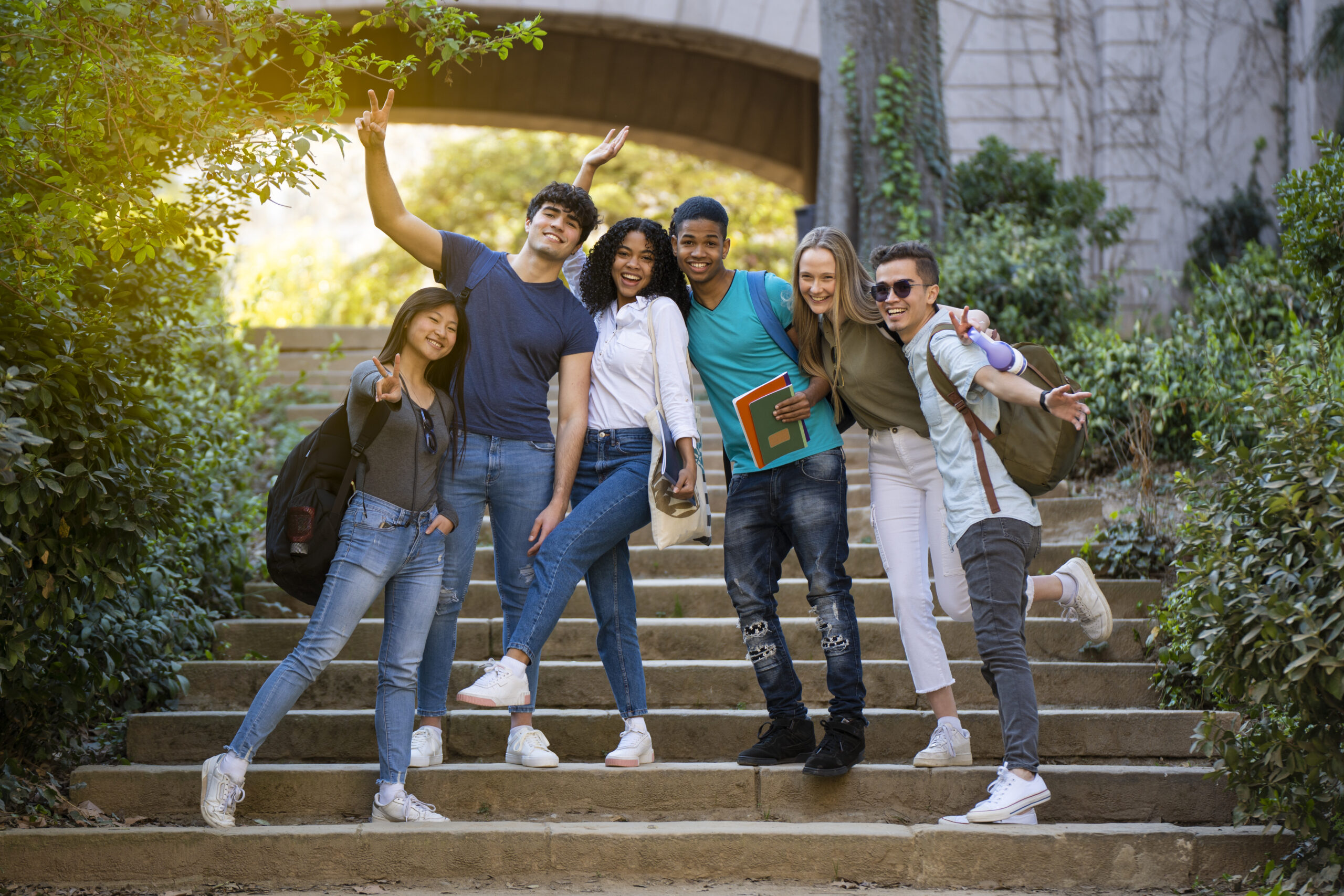 Group of young students in front of a university building