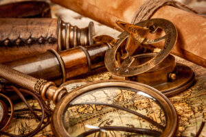 Vintage compass and world map
