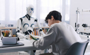 A student studies with the help of a robot.